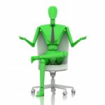 Businessman Doll Sitting On Chair Stock Photo