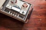 Old Tape Recorder On Wooden Background Stock Photo