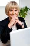 Attractive Blonde Business Executive Posing Stock Photo