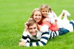 Lying Family In Outdoor Stock Photo