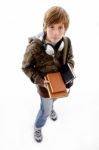 Boy With Books And Headphone Stock Photo