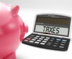 Taxes On Calculator Shows Income Tax Return Stock Photo