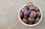 Chestnuts On Sack Stock Photo