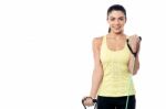 Woman Exercising With Rubber Band Stock Photo
