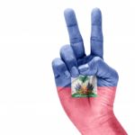 Flag Of Haiti In Victory Hand Stock Photo