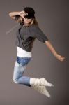 Young Women Jumping During Her Dance Stock Photo