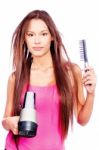 Woman Holding Blow Dryer And Comb Stock Photo