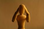Wooden Figure 'Hear No Evil' Stock Photo