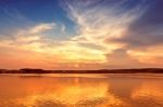 Sunset Over Lake With Colorful Sky Background Stock Photo