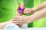 Foot Massage With Green Background Stock Photo