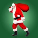 Santa Claus With Bag Full Of Gifts Stock Photo