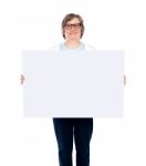 Old lady showing blank board Stock Photo
