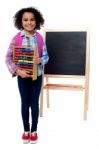 School Girl With Abacus And Pink Backpack Stock Photo