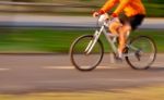 Biker On The Road With Motion Blur Stock Photo