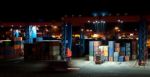 Commercial Container Port At Night Stock Photo