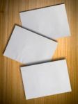 Crumpled Paper On Wood Wall Stock Photo