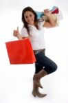 Happy Girl Holding Shopping Bags Stock Photo