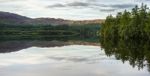 Reflections In Loch Alvie Stock Photo