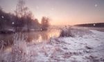 Winter Misty Dawn On The River. Snowflakes, Snowfall. Sunny Wint Stock Photo