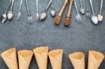 Flat Lay Ice Cream Cones Collection , Spoons ,fork And Honey Dip Stock Photo