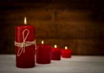Red Candles On Wooden Floor,festive Or Spa Concept Ideas Background  Stock Photo