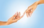 Finger Tips Reaching Out Each Other, Close-up Stock Photo