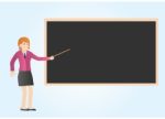 Teacher Pointing At Blackboard Stock Photo