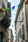Flying Fish Across A Street In Citta Alta Bergamo Stock Photo
