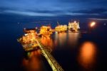 The  Large Offshore Oil Rig Drilling Platform At Night Stock Photo