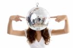 Woman Balancing Mirror Ball With Fingers Stock Photo
