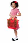 Charming Kid Carrying School Stationery Stock Photo