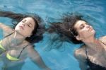 Two Women In The Pool Stock Photo