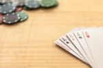 Cards And Poker Chips On Wooden Background Stock Photo
