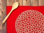 Round Rope Napkin Or Stand, Red Place Mat  And Spoon On A Wooden Stock Photo
