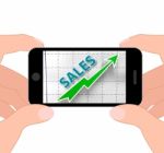 Sales Graph Displays Increased Selling And Earnings Stock Photo