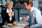 Corporate People Toasting Coffee At Cafe Stock Photo