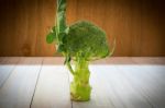 Broccoli On  Wooden Background Stock Photo