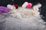 Macro Shot Of Powder By Open Pills Stock Photo