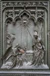 Detail Of The Main Door At The Duomo Cathedral In Milan Stock Photo