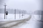 Snowfall And Sleet On Winter Road. Ice Snowy Road. Winter Snowst Stock Photo