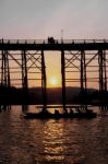 Silhouetted Bridge At Sunset Stock Photo