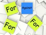 Against For Post-it Notes Mean Disagree With Or Support Stock Photo