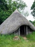 Reconstruction Of A Late Bronze Age Roundhouse In The Grounds Of Stock Photo