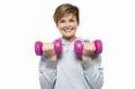 Beautiful Young Woman With Dumbbells Stock Photo