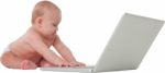 Cute Baby Boy Using Laptop Computer Stock Photo