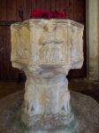 Medieval Font In St Andrew's Covehithe With Benacre Church In Co Stock Photo