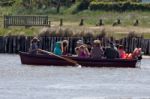 People Using The Ferry In Southwold Stock Photo