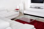 Living Space With White Leather Couch Stock Photo