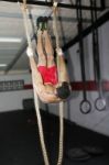 Crossfit Athlete On A Dark Background.  Focus On The Body Stock Photo