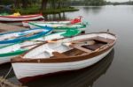 Group Of Rowing Boats At Thorpeness Boating Lake Stock Photo